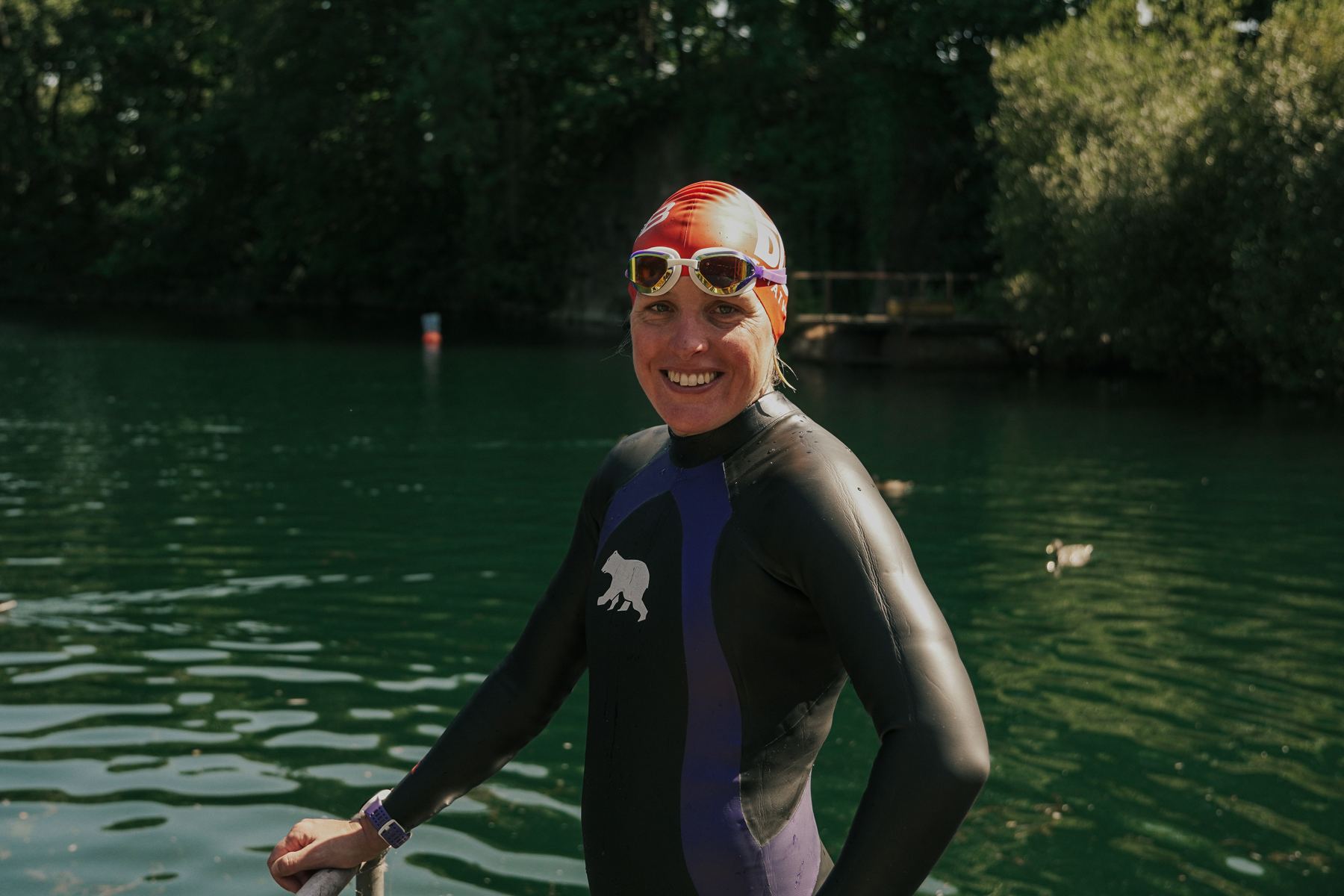 Dee Allen in her wetsuit by the lake