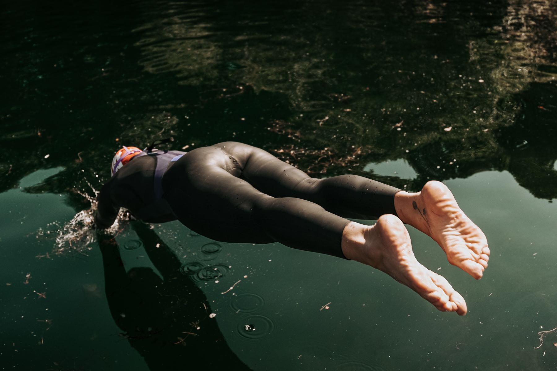 Dee Allen diving into open water