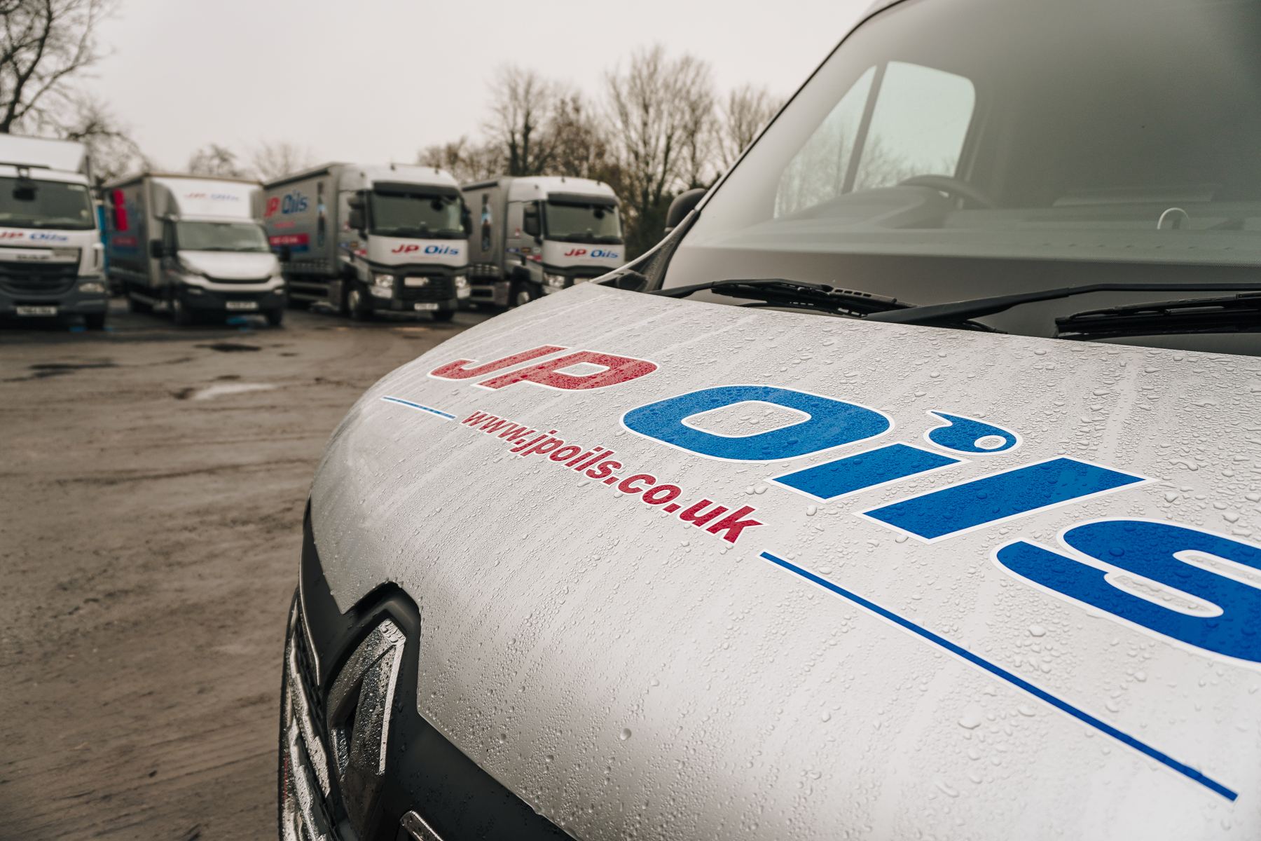 JP Oils van bonnet with the fleet behind