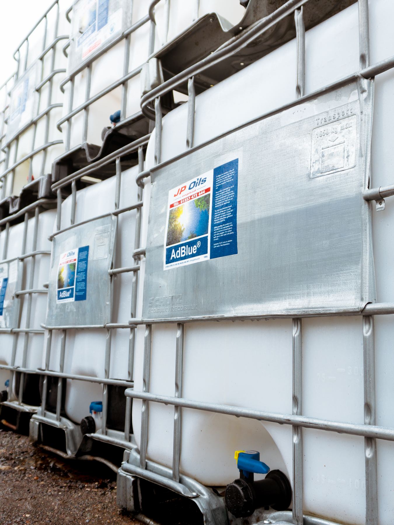 AdBlue containers stacked on site