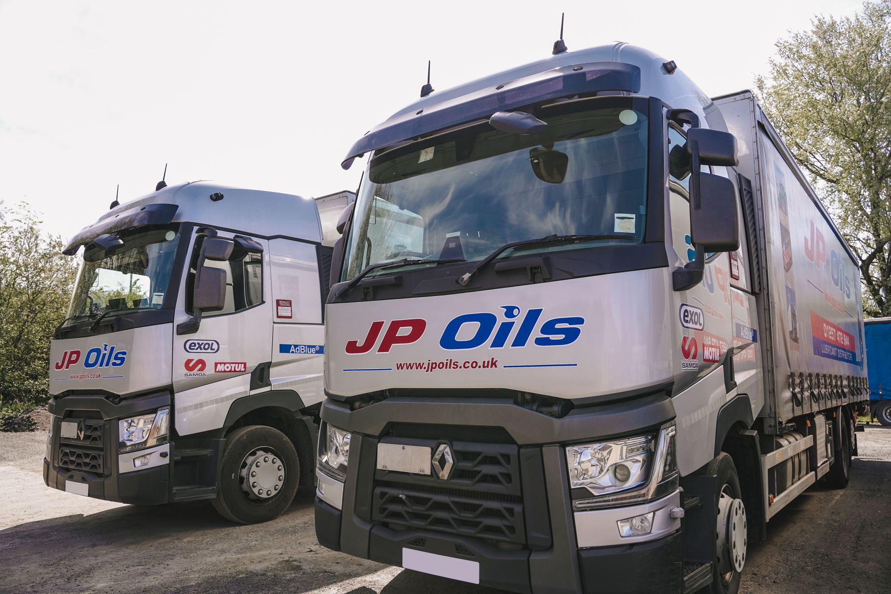 Two JP Oils lorries side by side